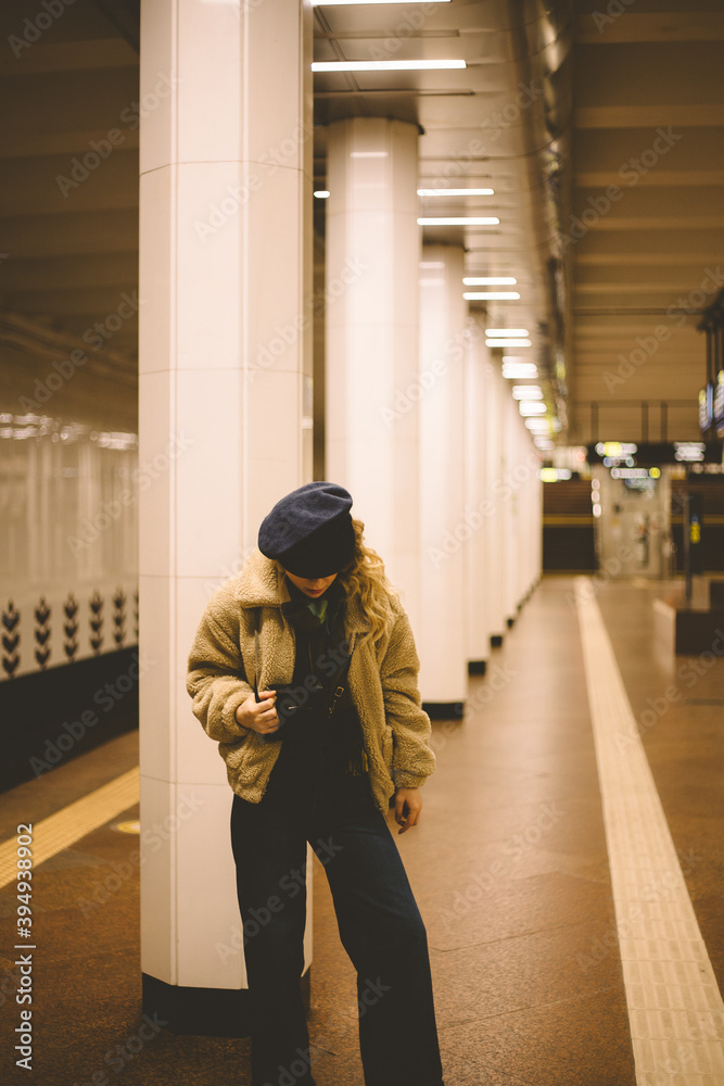A young traveler girl in metro