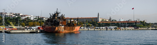 panorama of the port of Istanbul Kadikoy rusty old abandoned ship