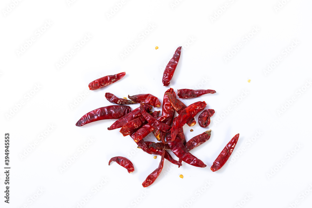 Dried red chili on white background, pile of red dried chilli pepper cayenne. Dried red chili on white background, pile of red dried chilli pepper cayenne.