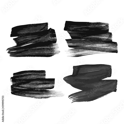 Set of four black hand drawn ink stains
