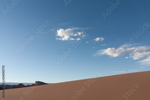 sand dune landscape with blue sky