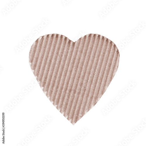 the symbol of a heart set sail champagne color cut from corrugated cardboard isolated on white background