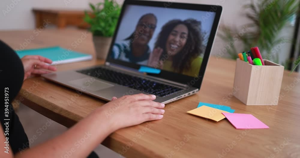 Multiracial friends doing video call from home during coronavirus lockdown - Social distance between people and technology concept