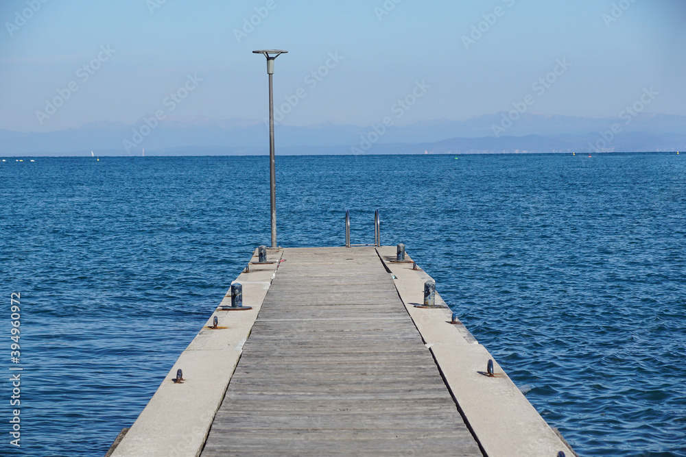 Pier in the sea . jetty over the beautiful sea with blue sky