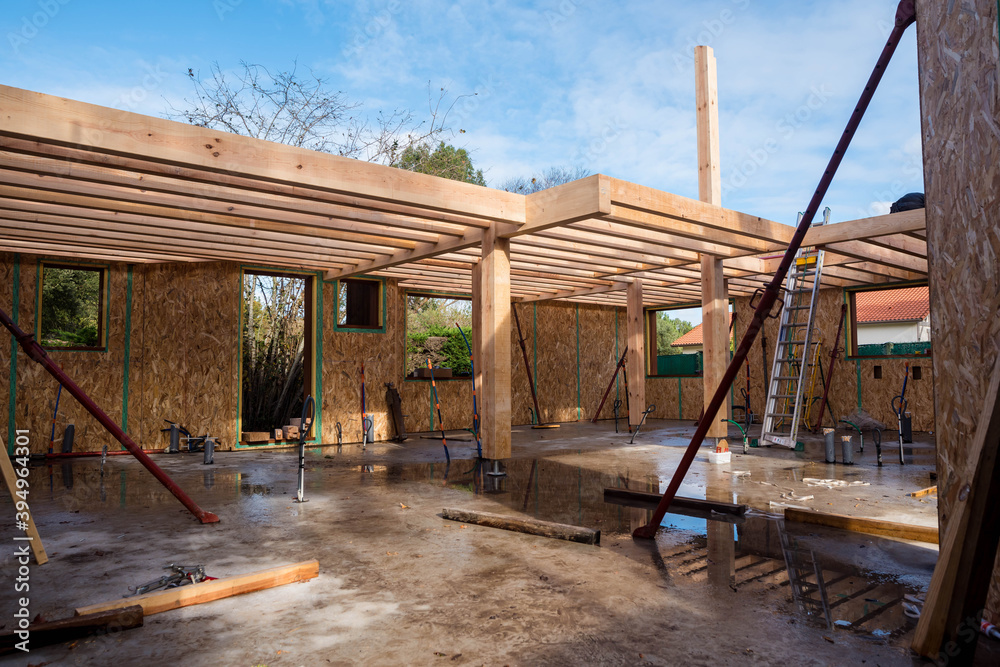 Fototapeta premium construction of a wooden house