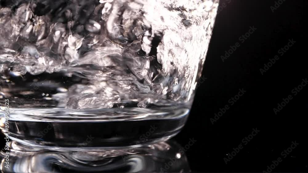 Water pouring into glass Water pouring into glass
