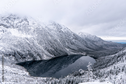 Fototapeta Naklejka Na Ścianę i Meble -  Beautiful view of idyllic winter with crystal clear mountain lake at Eye of the Sea or Morskie Oko, Poland tatras mountain