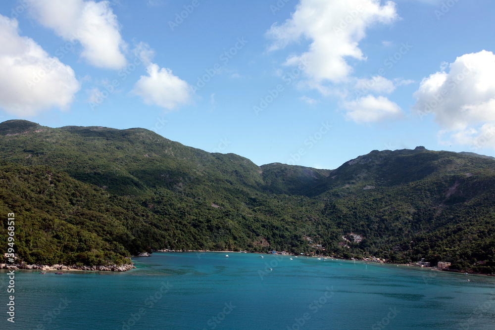 The beauty of the port of Labadee in Haiti's iland, clear vision with high mountains with tropical forest present trees and special animals.Dense and evergreen vegetation. The beauty of the port of Labadee in Haiti's iland, clear vision with high mountains with tropical forest present trees and special animals.Dense and evergreen vegetation.