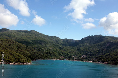 The beauty of the port of Labadee in Haiti's iland, clear vision with high mountains with tropical forest present trees and special animals.Dense and evergreen vegetation.