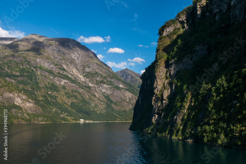  Panoramic view of the Geiranger fjord near the port of Geiranger, Norway. Nature of Norway. View from the Cruise Ship on the fjord in Norway