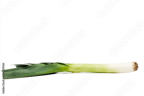 Juicy leeks on an isolated white background. Healthy food and vitamins. Space for text.