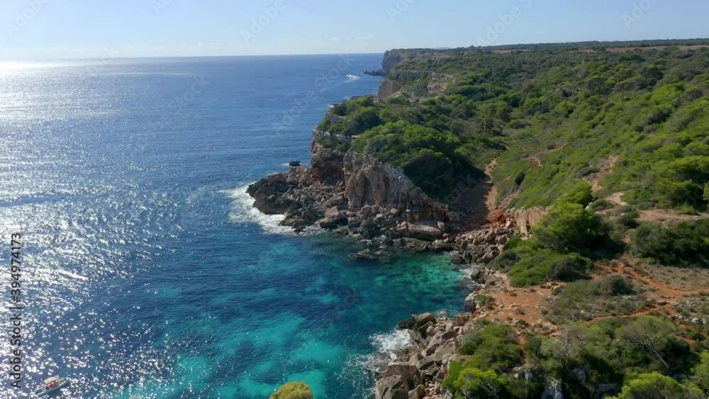 Aerial view, flight at Cala d'es Moro, rocky coast at Cala de s'Almonia, nature reserve Cala Llombards, Mallorca, Balearic Islands, Spain Aerial view, flight at Cala d'es Moro, rocky coast at Cala de s'Almonia, nature reserve Cala Llombards, Mallorca, Balearic Islands, Spain