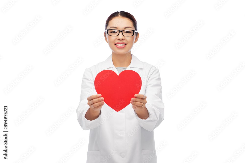 medicine, cardiology and healthcare concept - happy smiling asian female cardiologist doctor or nurse with red heart over white background medicine, cardiology and healthcare concept - happy smiling asian female cardiologist doctor or nurse with red heart over white background