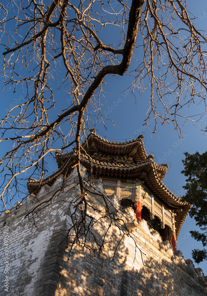 winter sunshine on the old tower in The Summer Palace, Beijing, China winter sunshine on the old tower in The Summer Palace, Beijing, China