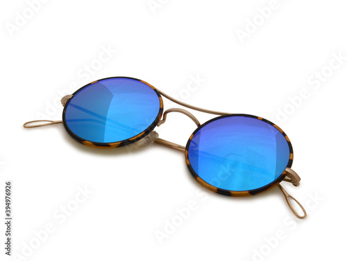 Fashion sunglasses with modern design on white background