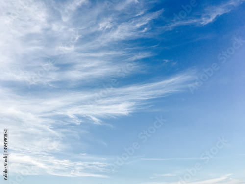 Blue sky with beautiful and fluffy white clouds