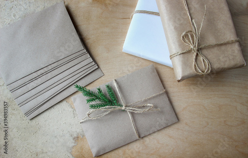 Christmas gift. A Packed letter tied with twine and decorated with a spruce branch.