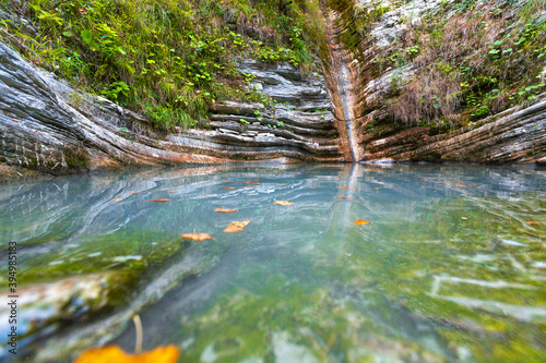 Fototapeta Naklejka Na Ścianę i Meble -  beautiful rocky waterfall in the forest