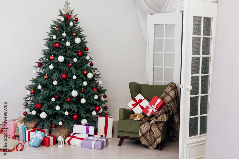 Beautiful Christmas decor of residential white room with stucco Beautiful Christmas decor of residential white room with stucco
