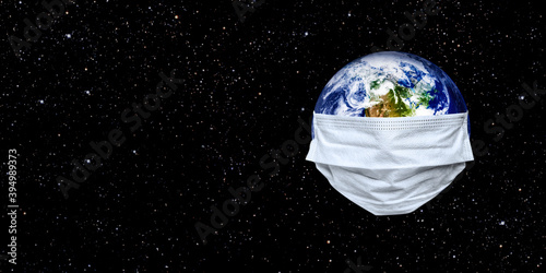 Fototapeta Naklejka Na Ścianę i Meble -  The whole earth is quarantined, the earth is wearing a maskCoronavirus and Air pollution pm2.5 concept. COVID-19