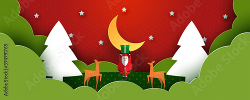 Merry Christmas and Happy New Year.Winter season landscape.Santa Claus with gift box and couple of deers.