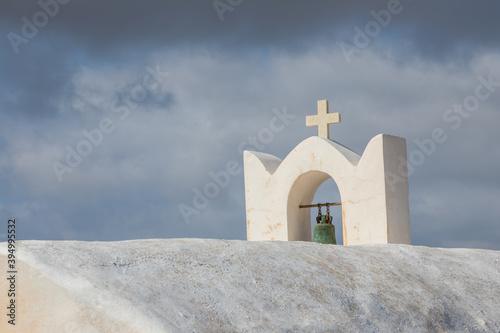 Traditional white chapel , Ios island, Greece.