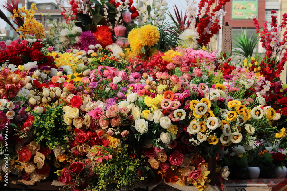 Delhi, India - November 14 2020 : Beautiful Artificial Flower Shop in Delhi Street market Delhi, India - November 14 2020 : Beautiful Artificial Flower Shop in Delhi Street market
