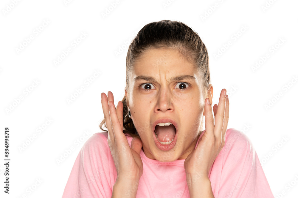Portrait of young shocked woman without makeup Portrait of young shocked woman without makeup