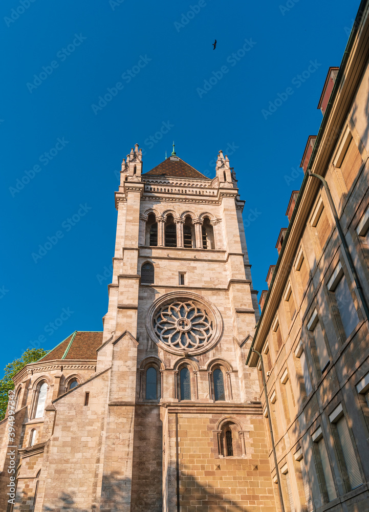 View of St. Pierre Cathedra in Geneva, Switzerland. The tower of church with rose window.