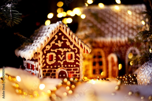 A fabulous photo with Christmas New Year's decorations from gingerbread huts and magic lights