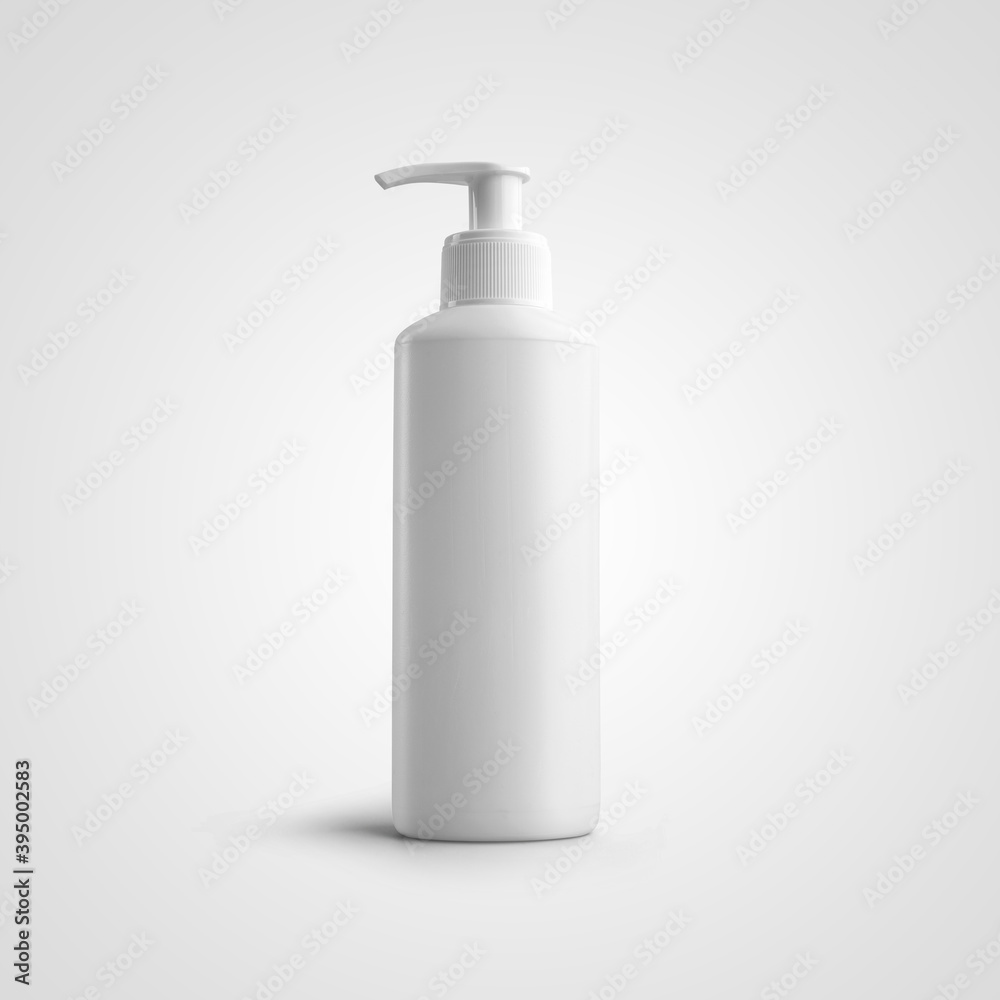 Mockup of a round white jar with a dispenser, empty bottle for liquid, isolated on background. Mockup of a round white jar with a dispenser, empty bottle for liquid, isolated on background.