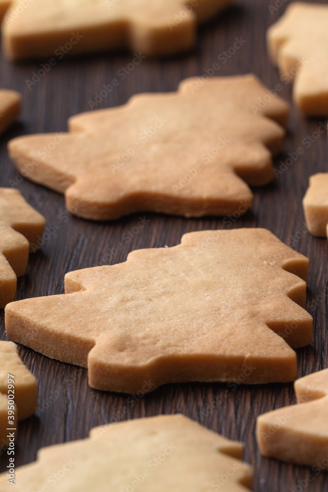 Top view of decorated Christmas tree cookie on wooden table background with copy space. Top view of decorated Christmas tree cookie on wooden table background with copy space.