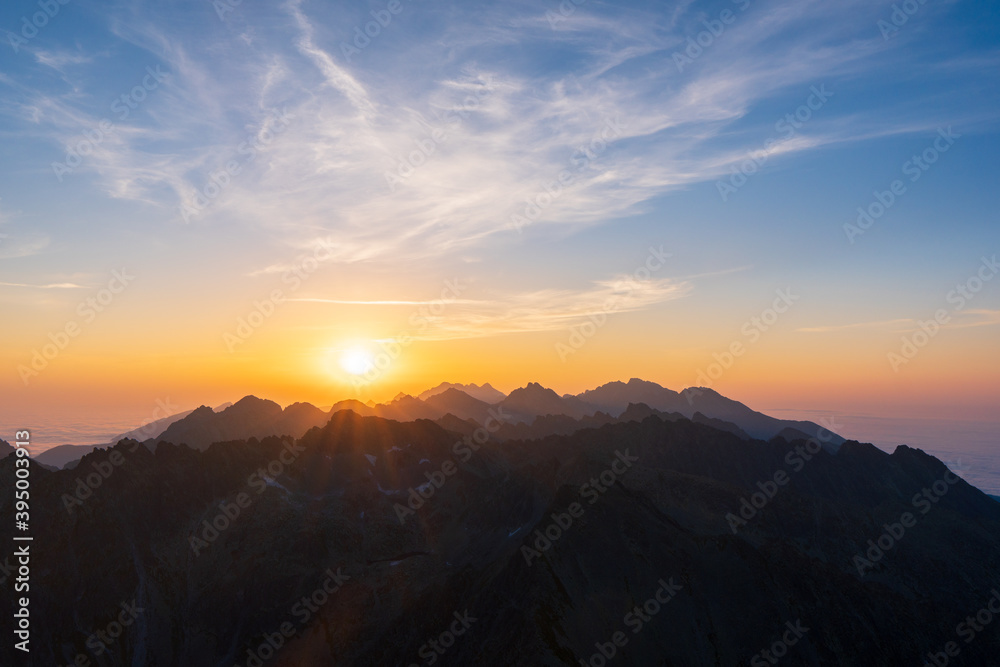 Sunrise in High Tatras mountains national park in Slovakia. Scenic image of mountains. The sunrise over Carpathian mountains