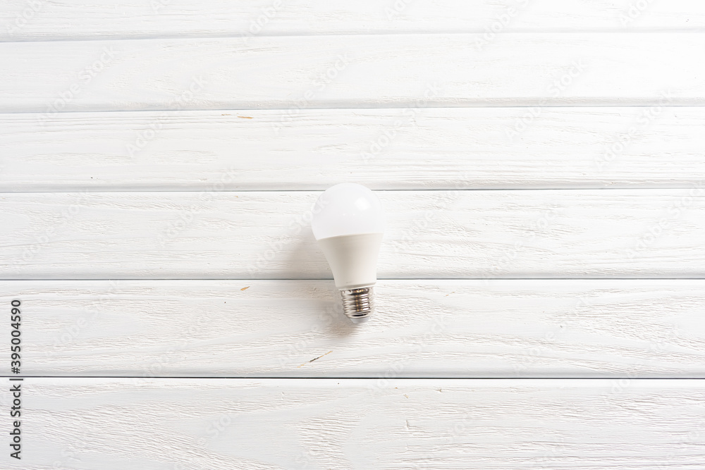 Eco lamp in hand. Led lamp, green technologies. Eco lamp. Energy efficiency concept. Eco lamp in hand. Led lamp, green technologies. Eco lamp. Energy efficiency concept.