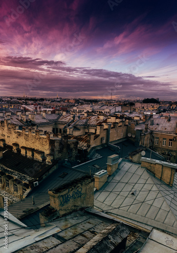Saint-Petersburg, Russia. Cityscape panorama of old city centre, view from a rooftop. Sunset © oluuuka