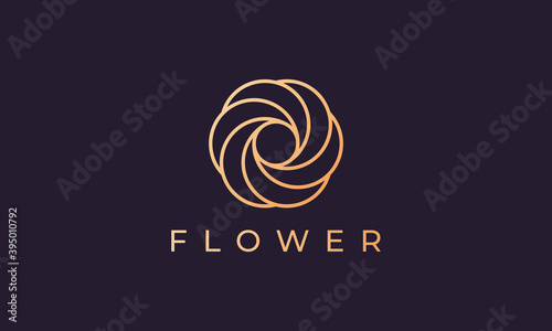 Beauty and feminine simple flower logo in gold with luxury line art style