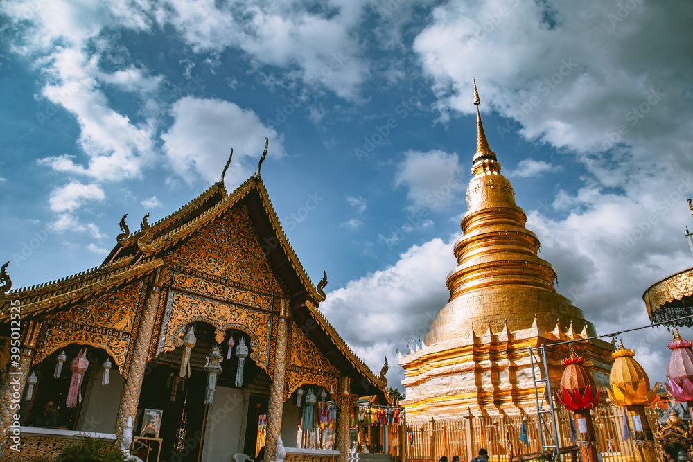 Fototapeta premium Wat Phrathat Haripunchai Woramahawihan during Loy Khratong lantern festival in Lamphun, Chiang Mai, Thailand