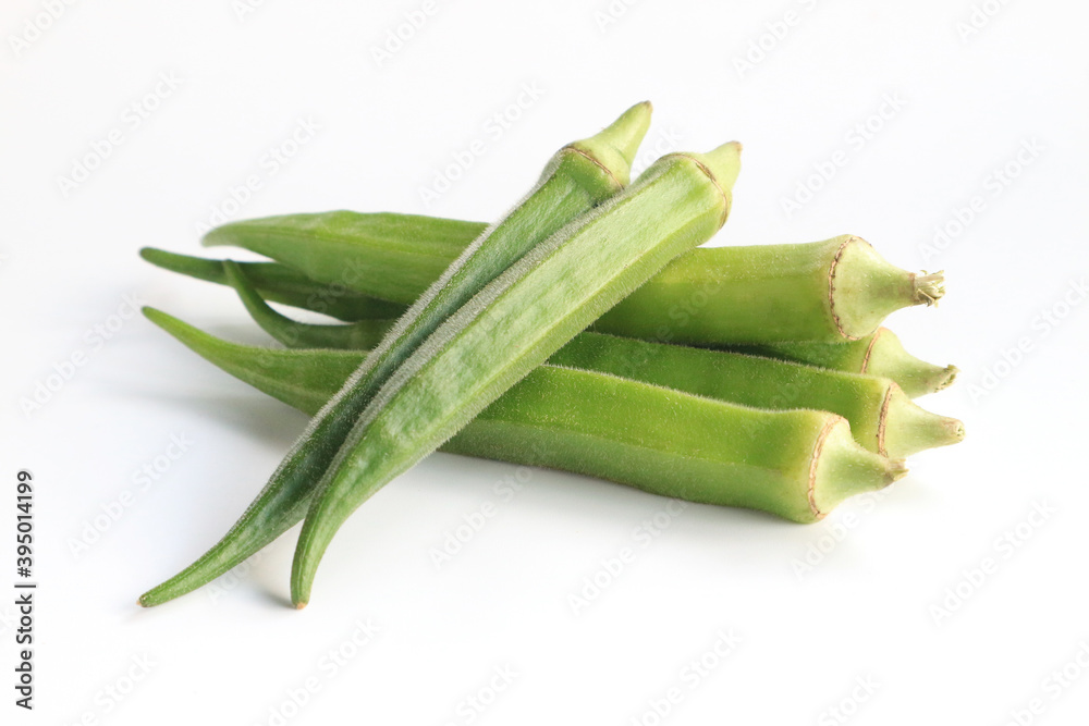 Fresh vegetable okra on white background.