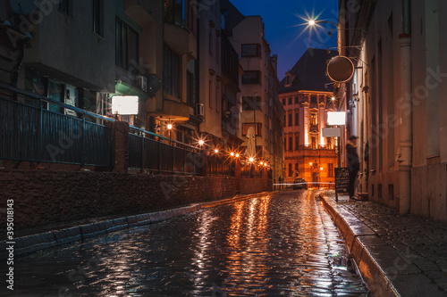 wet street of the old town in wroclaw in poland