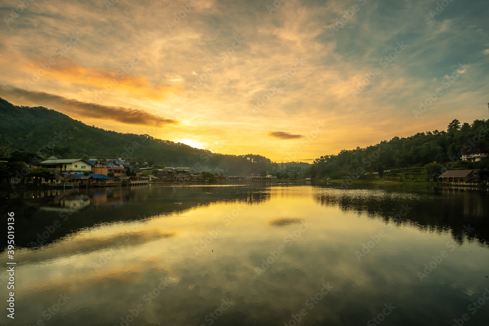 Beautiful of lake view in the morning sunrise, Ban Rak Thai village, landmark and popular for tourists attractions, Mae Hong Son province, Thailand. Travel concept