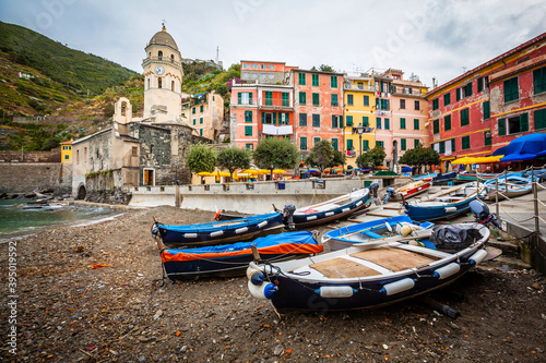 Boats and houses in the small harbour of Vernazza in Cinque Terre, Italy