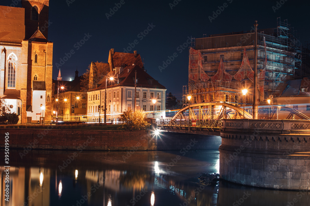 night view of the streets of the city of wroclaw with bridges