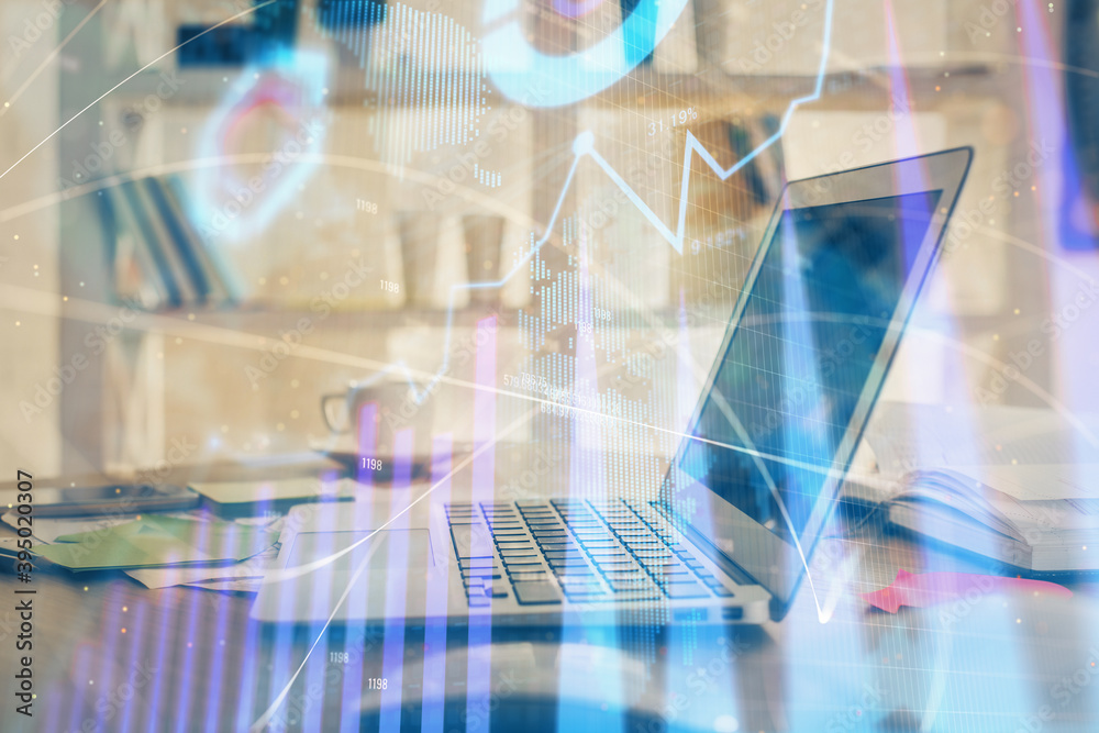 Forex market chart hologram and personal computer background. Multi exposure. Concept of investment.