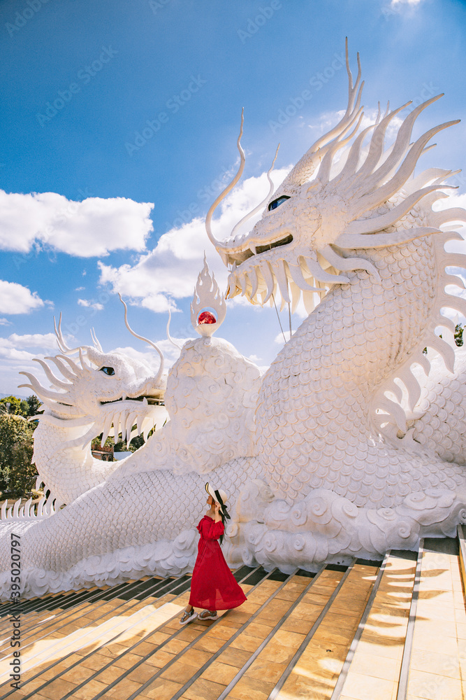 Wat Huay Pla Kang, white big buddha and dragons in Chiang Rai, Chiang Mai province, Thailand - obrazy, fototapety, plakaty 