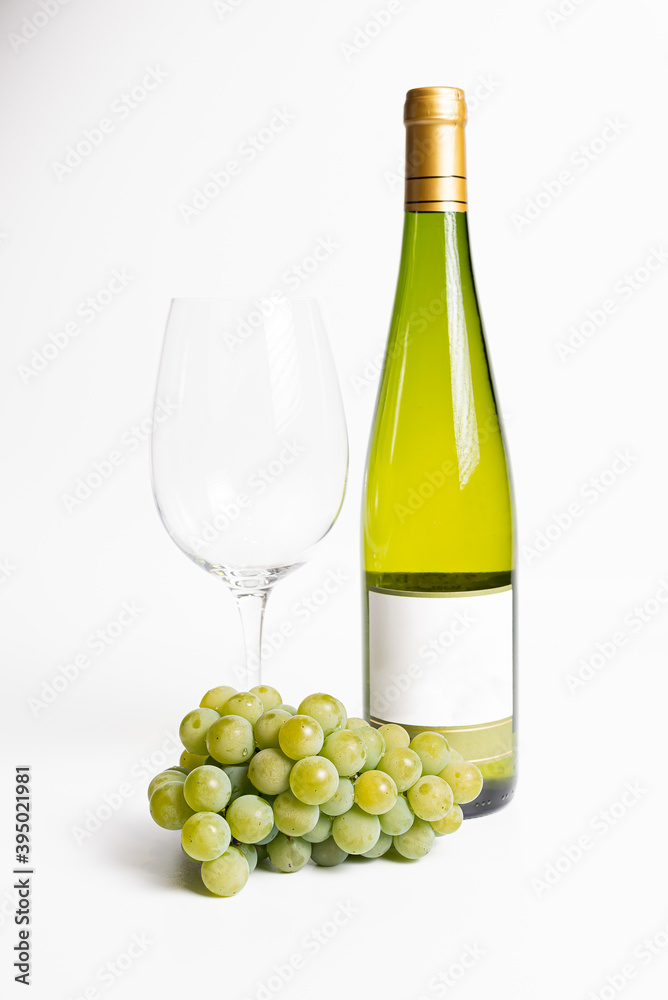 Wine bottle and two wine glasses. Wine bottle against a white background Wine bottle and two wine glasses. Wine bottle against a white background