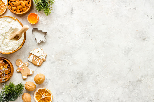 Christmas cooking background with gingerbread cookies, overhead view, flat lay