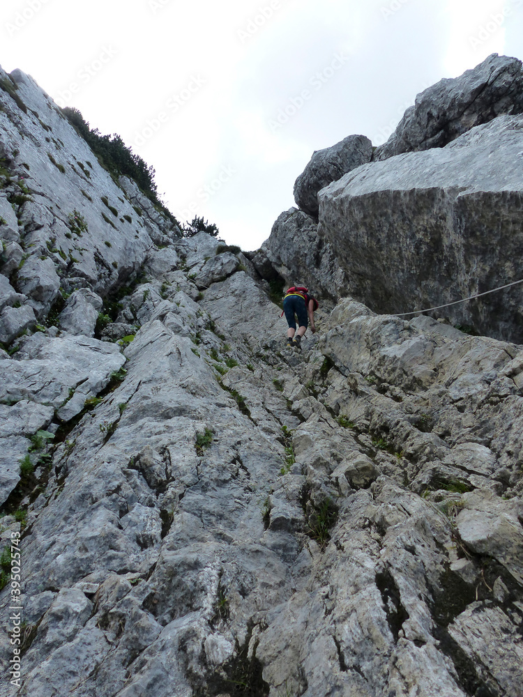 Climber at Scheffauer mountain via ferrata, Tyrol, Austria