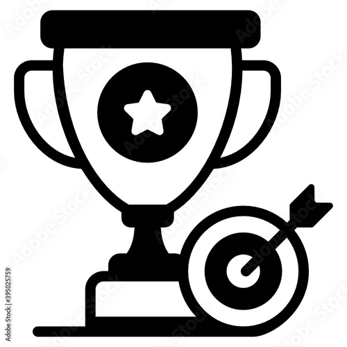 
Success goal icon, target with trophy in filled style 
