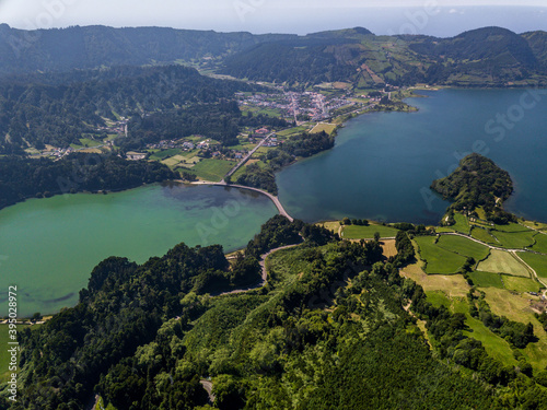 Aerial View with the Twin Lakes of "Sete Cidades" on the background with some nebline of early morning of a summer day. São Miguel Island, Azores.