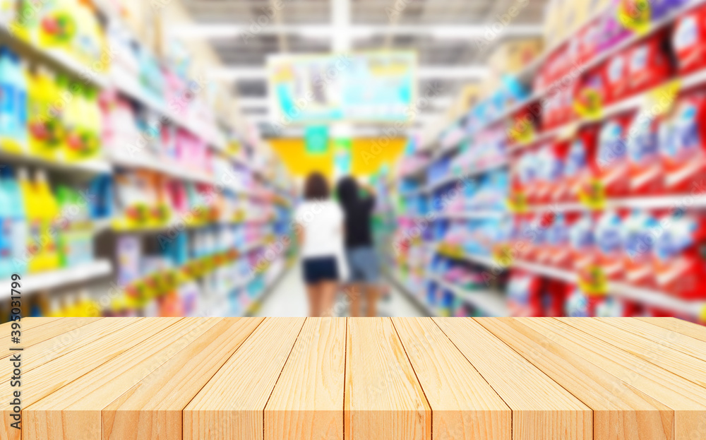 Empty wood table top on shelf in supermarket blurred background